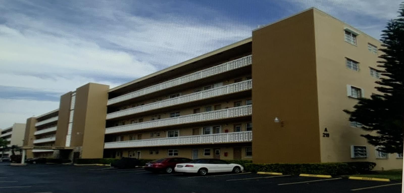 a front view of a building with residential street