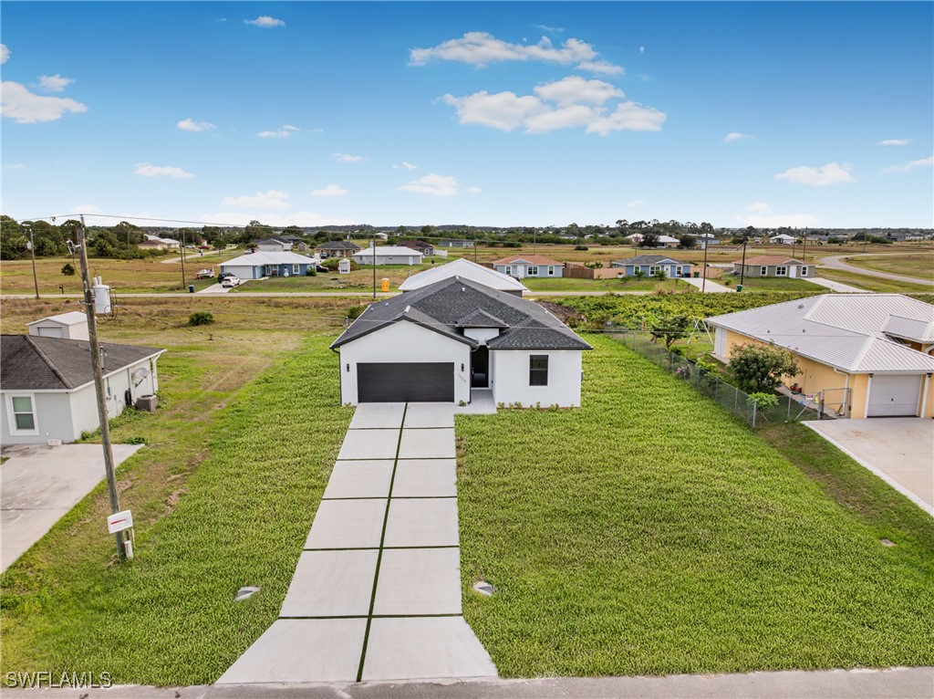 a view of a lake with a big yard