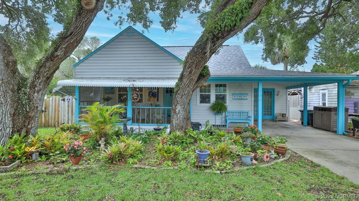 front view of a house with a yard