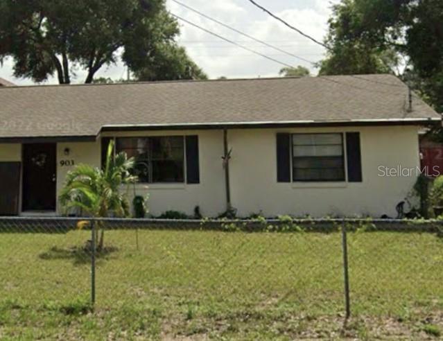 a house with garden in front of it