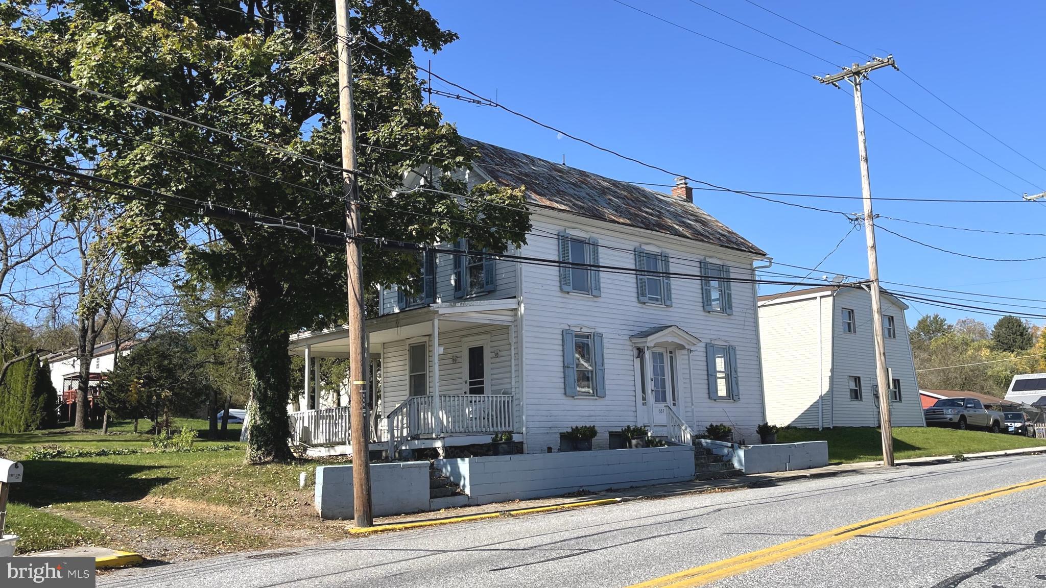 a front view of a building with street view