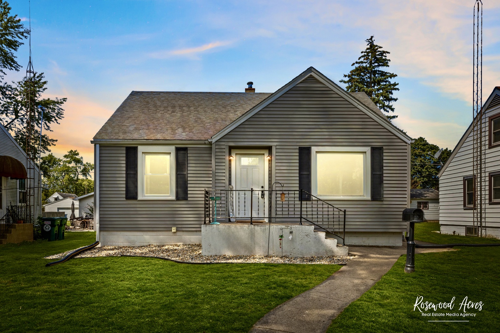 a front view of a house with a yard