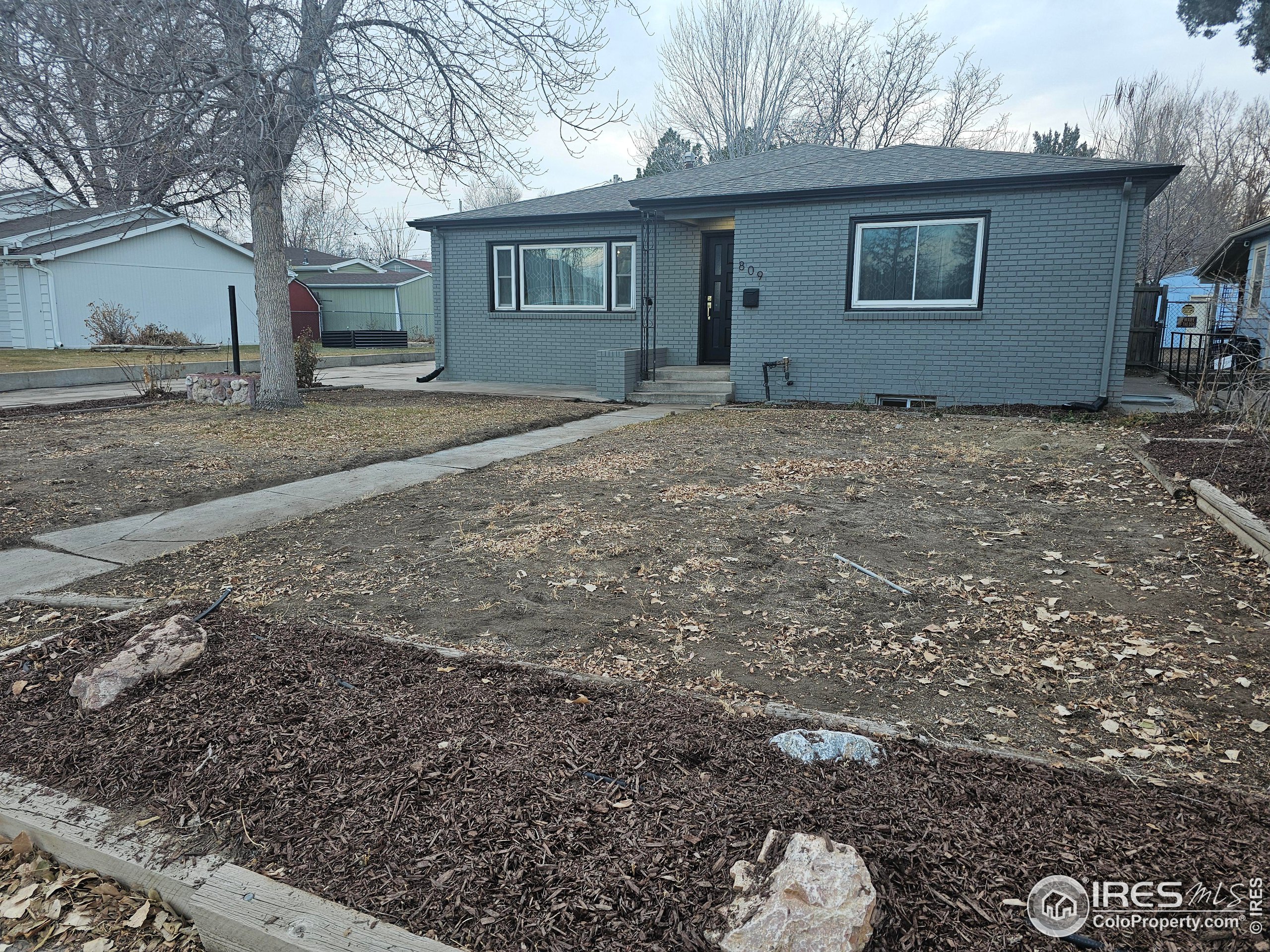 a view of an house with backyard space