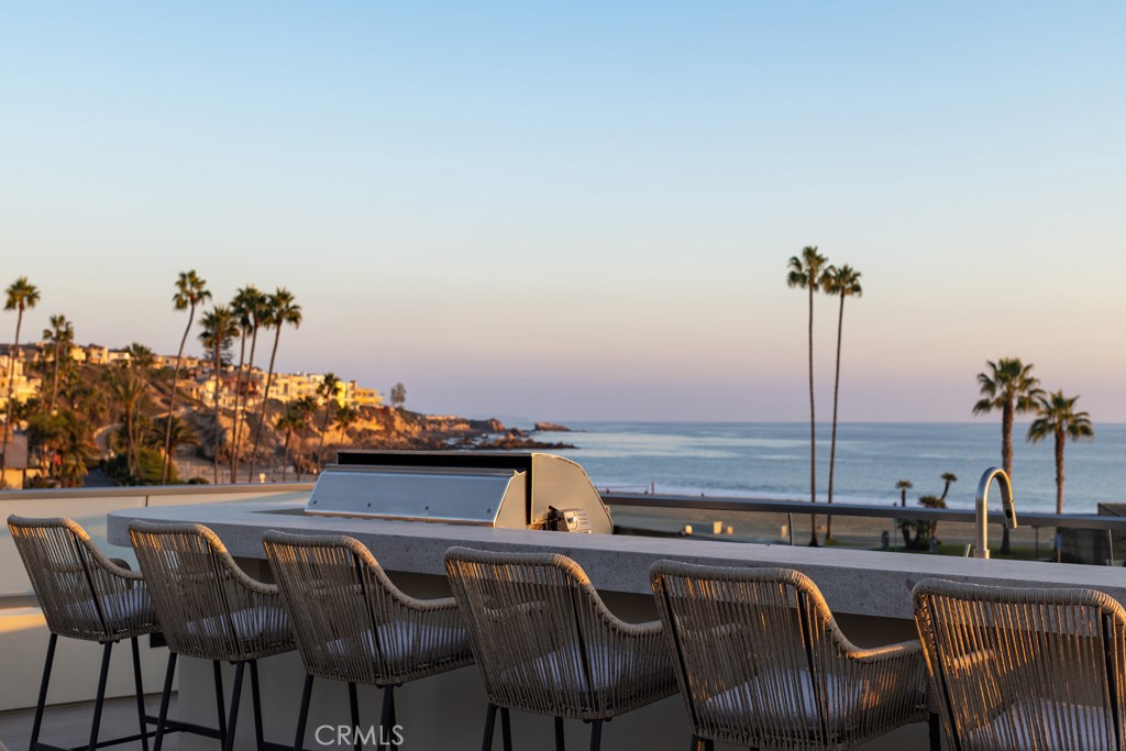 a view of a chairs and table on the terrace