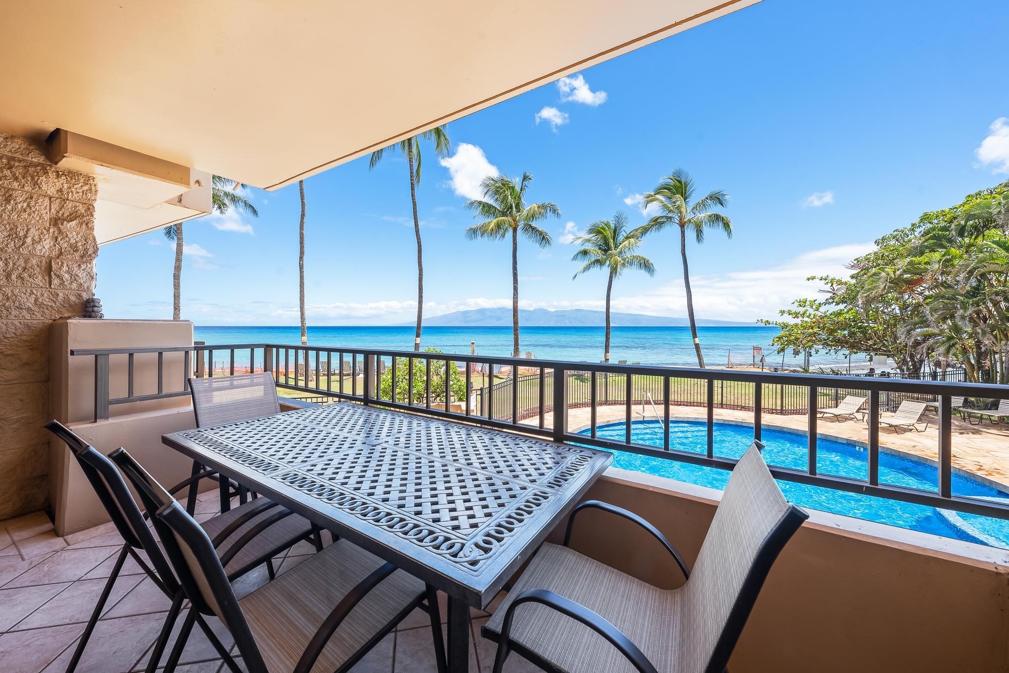 a view of a balcony with furniture