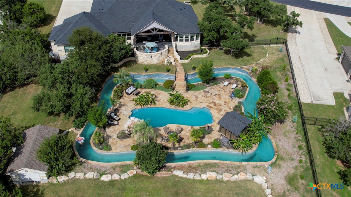 an aerial view of a house with a garden