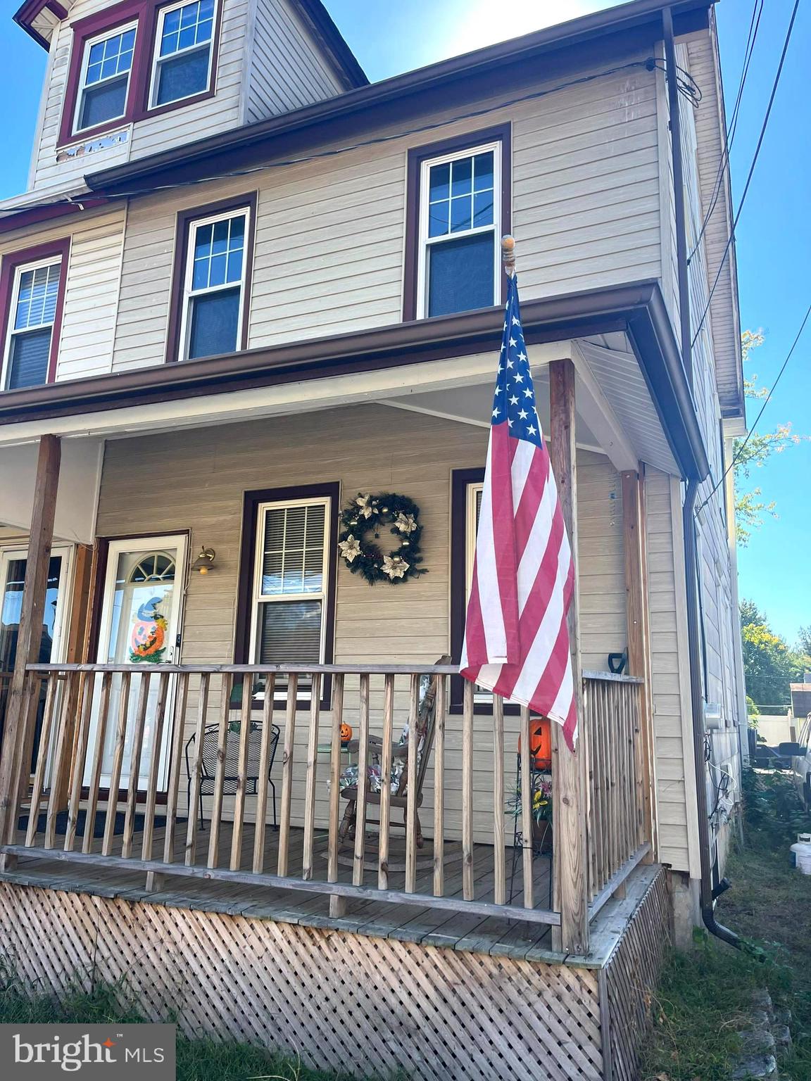 a front view of a house with a fence