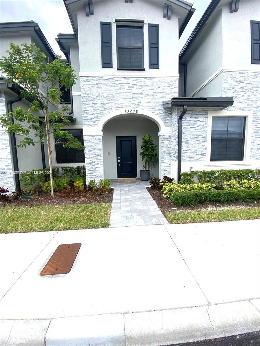 a view of outdoor space yard and front view of a house