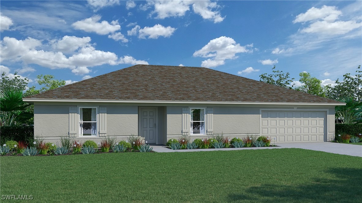 a front view of house with yard and green space