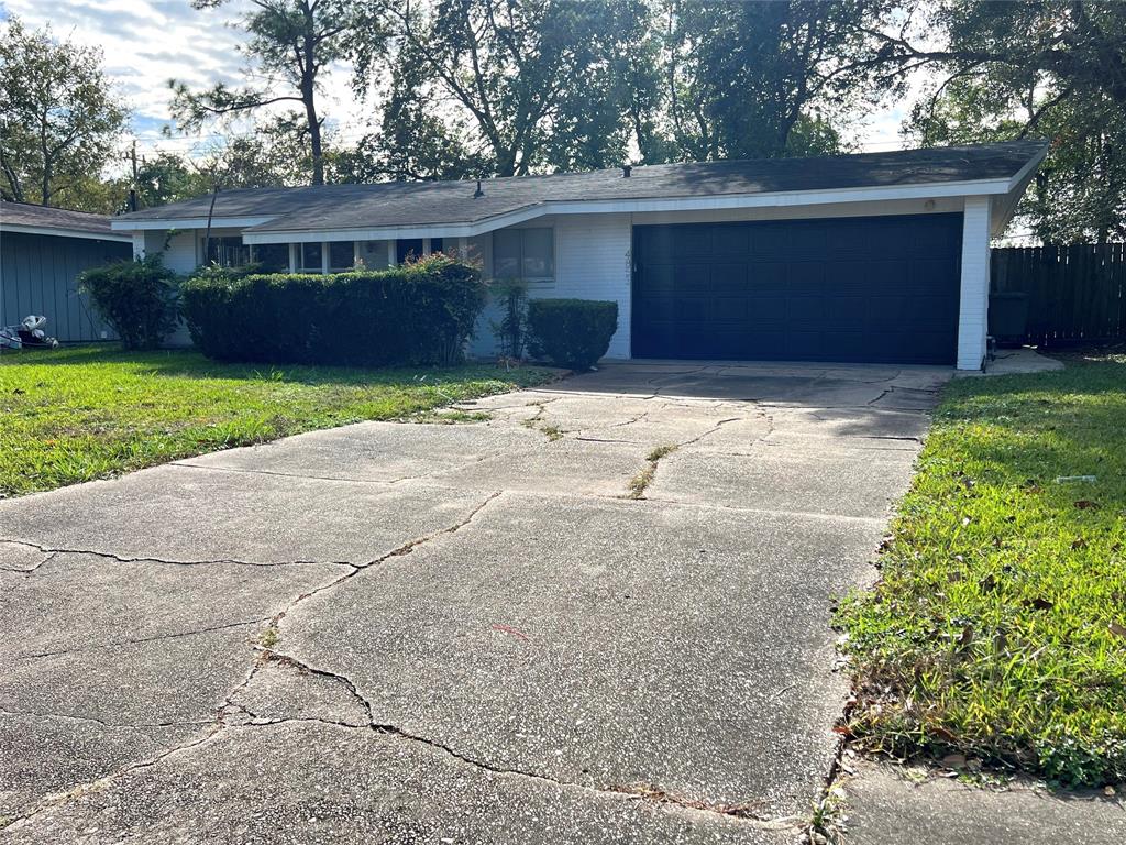 a front view of house with a yard