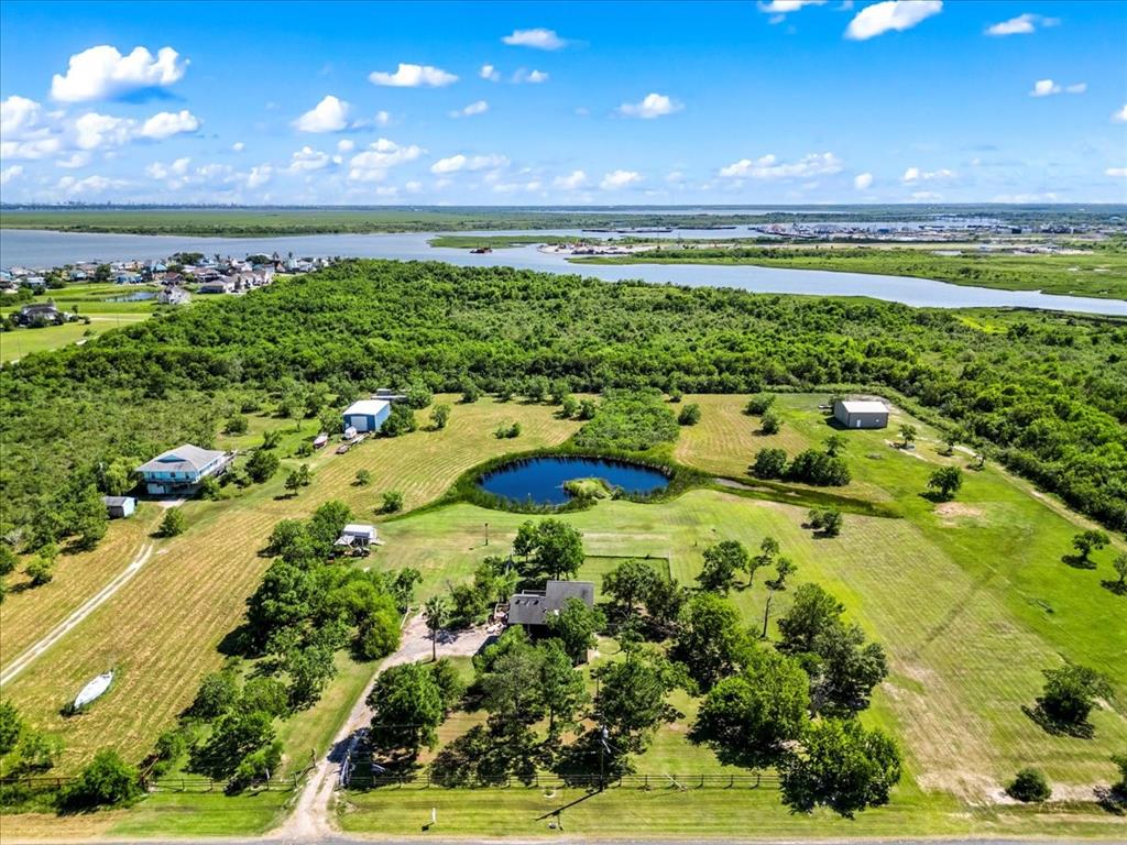 a view of a lake with a big yard