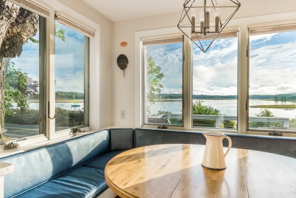 a view of a living room with a floor to ceiling window