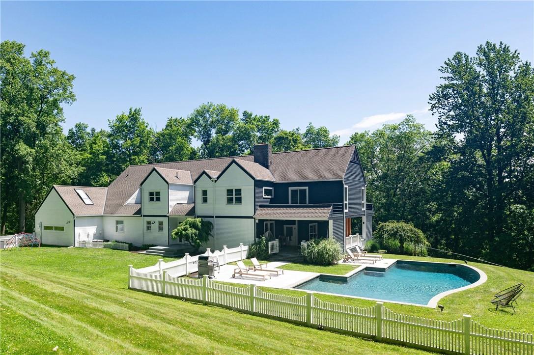 Rear View - pool with yard and patio area