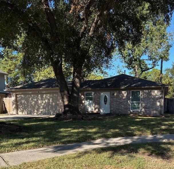 a view of house with a yard