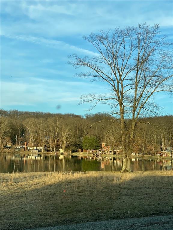 a view of lake with residential houses