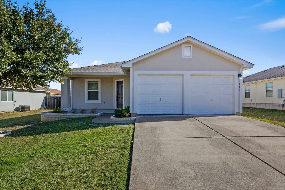 a front view of house with yard