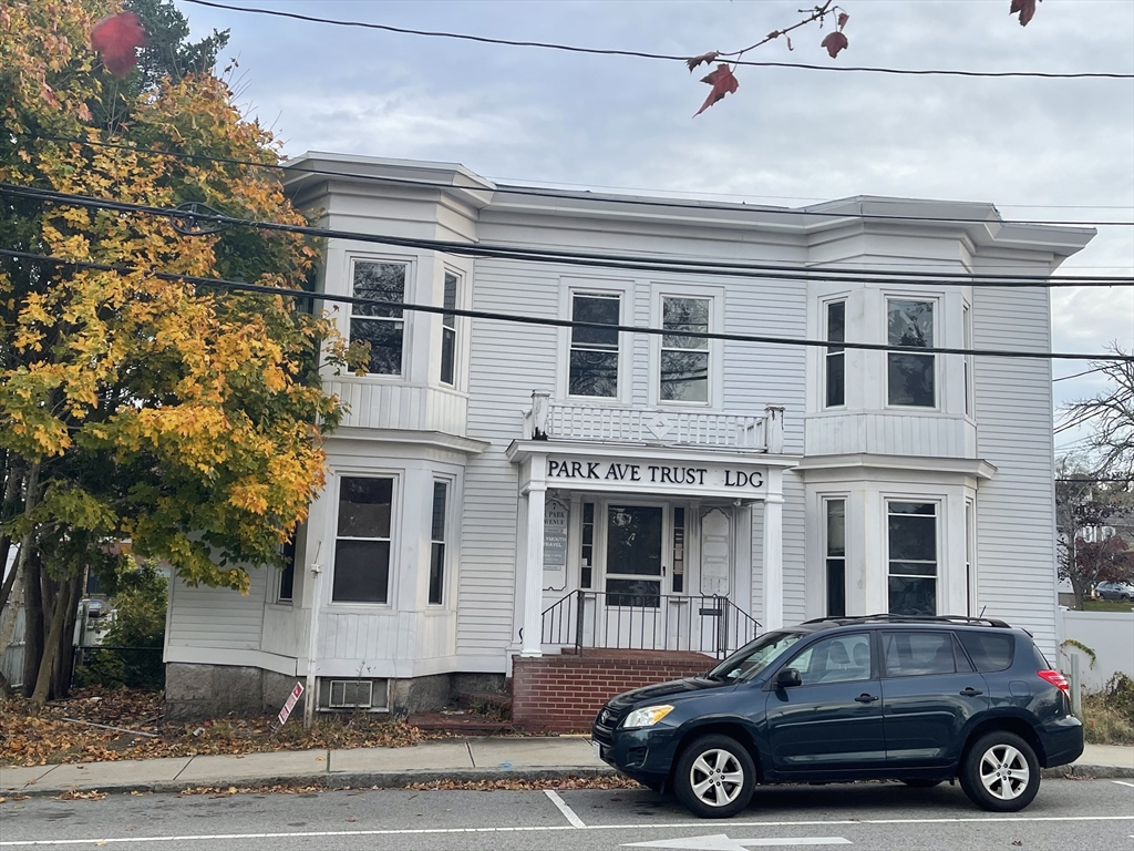 a car parked in front of a building