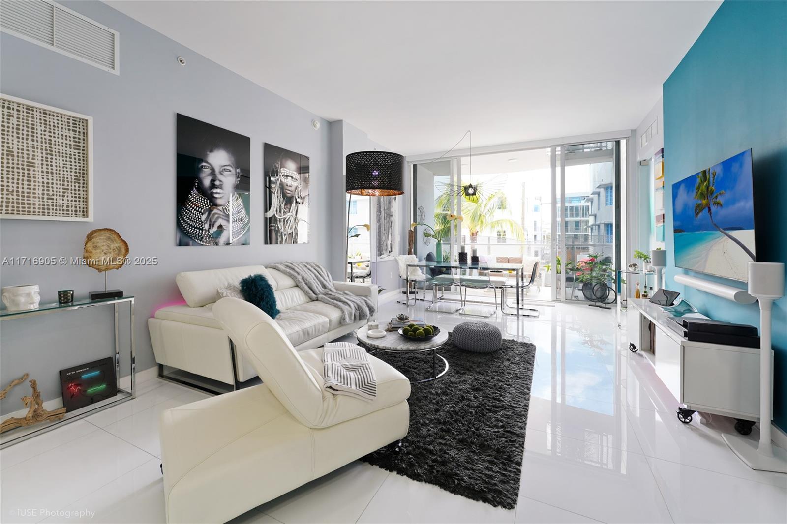 a living room with furniture fireplace and flat screen tv