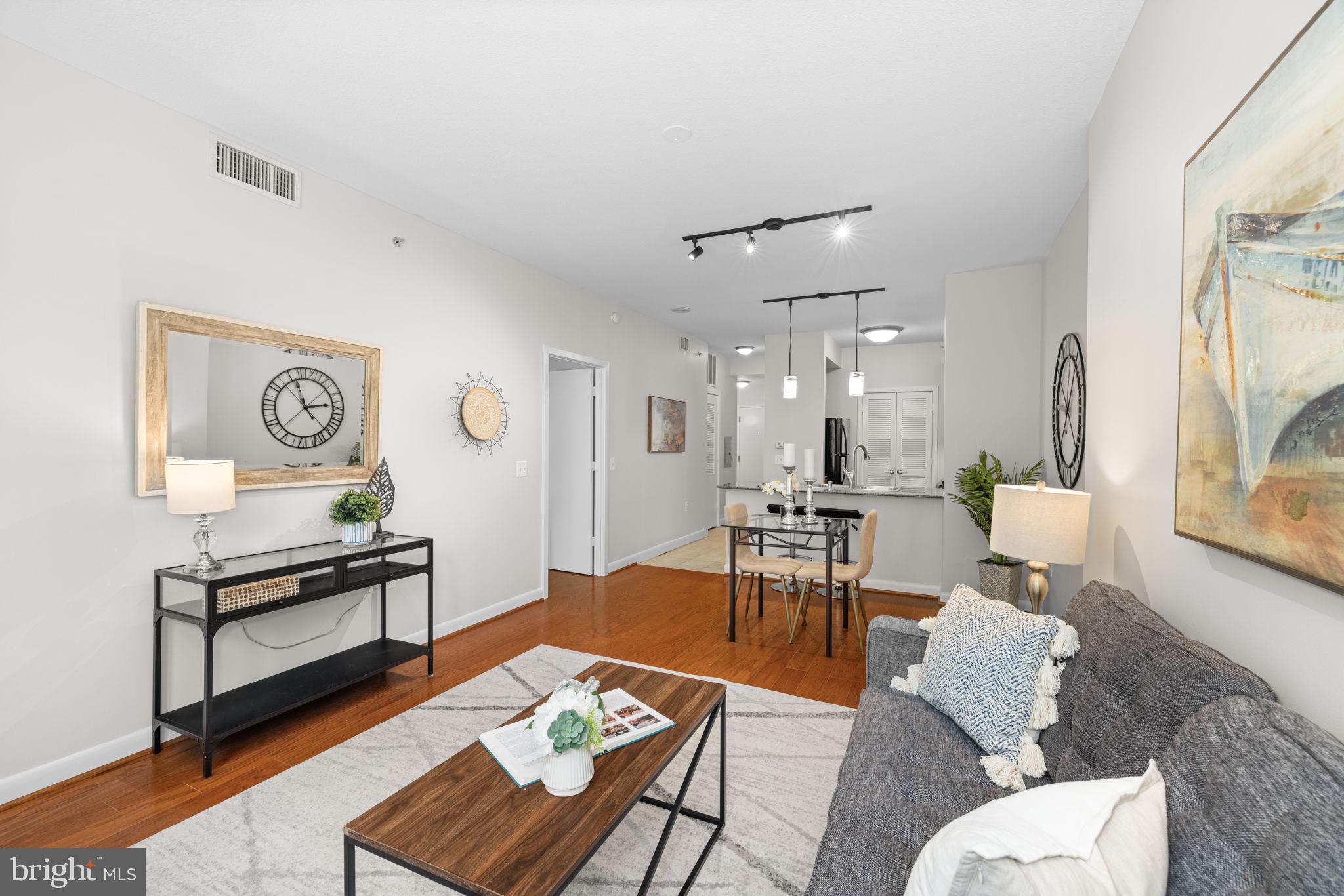 a living room with furniture and a table