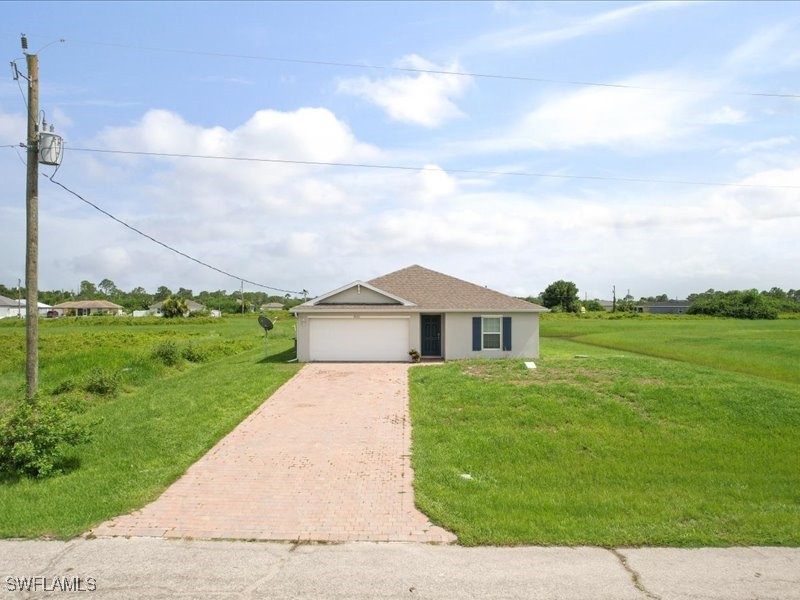 a view of a house with garden