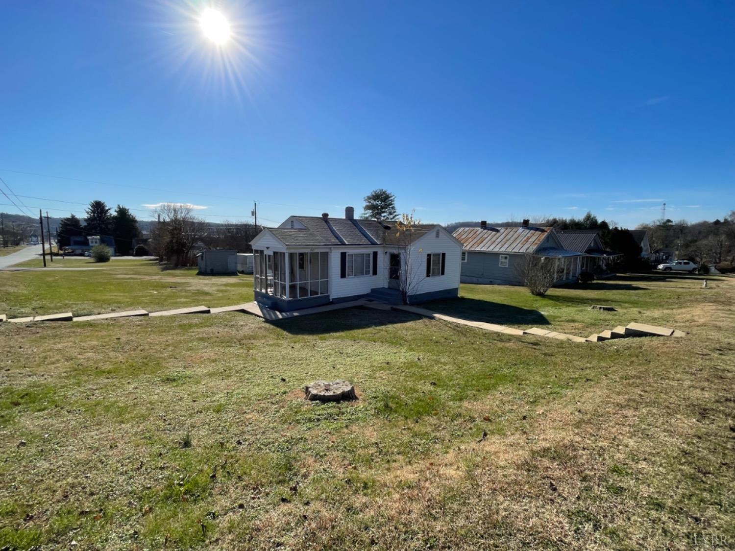 a view of a house with a big yard