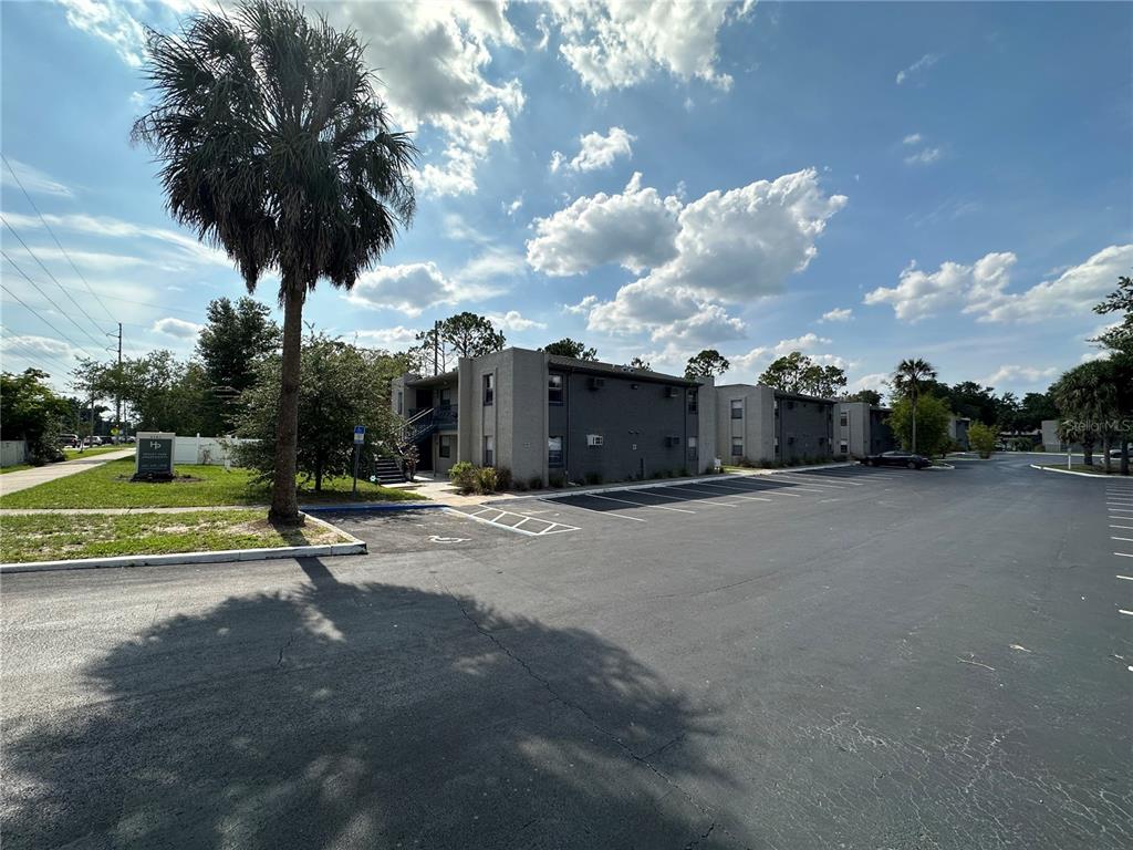 a view of a street with a building