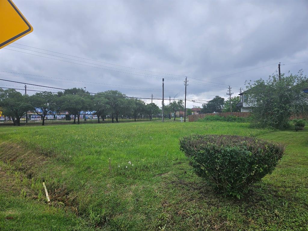 a view of a golf course with a garden