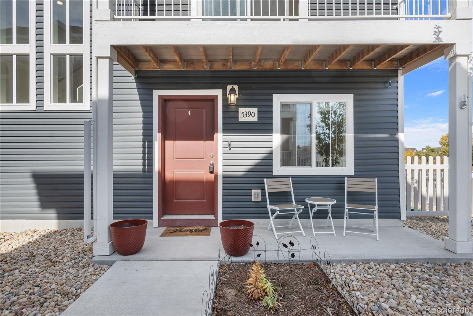 a front view of a house with patio