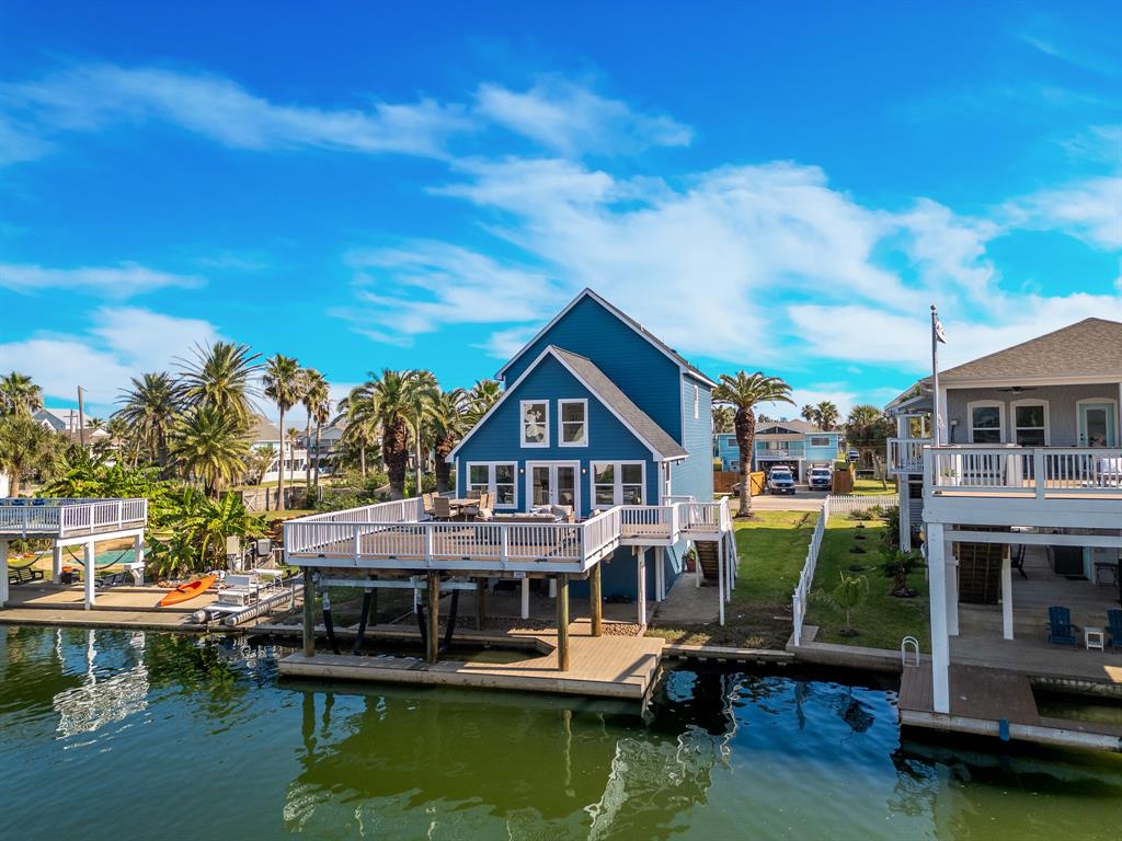 a house with river in front of it