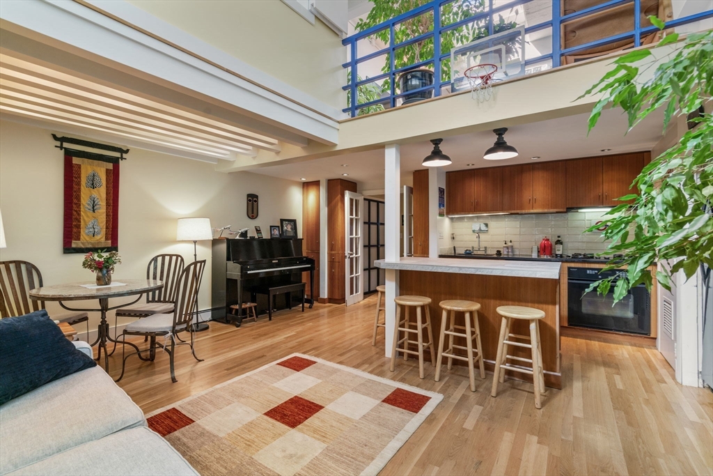 a room with furniture and wooden floor