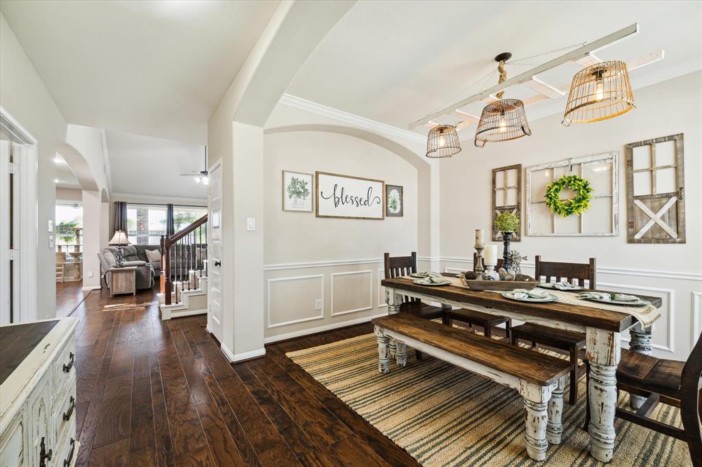 a view of a room with shelves and wooden floor