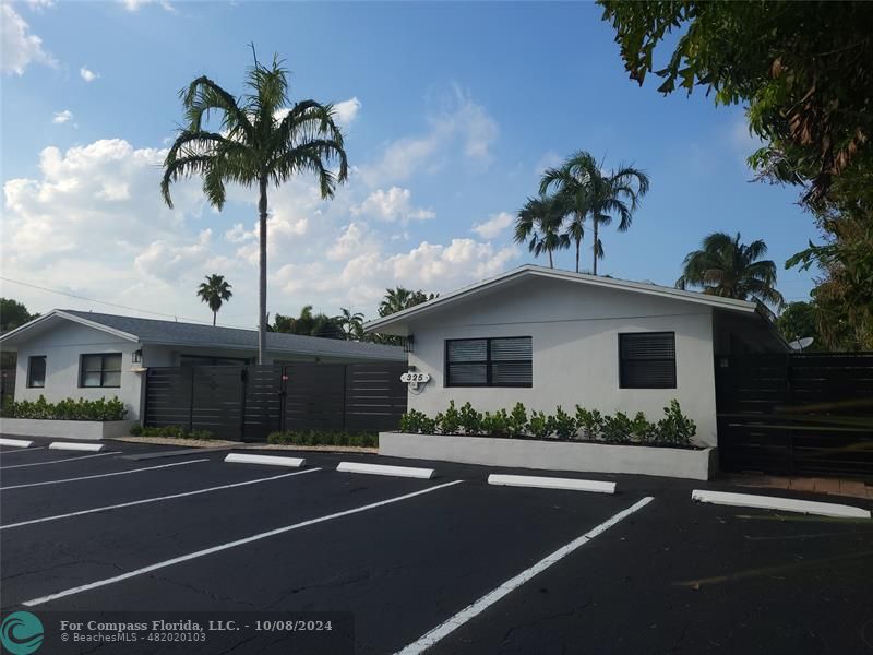 a front view of a house with yard