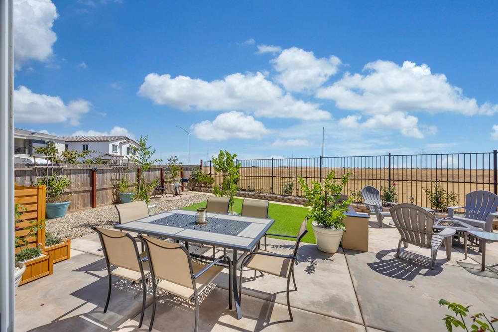 a view of a terrace with furniture