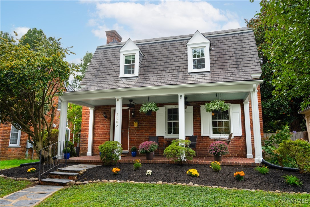 front view of house with a yard