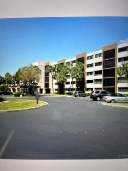 a view of building with yard