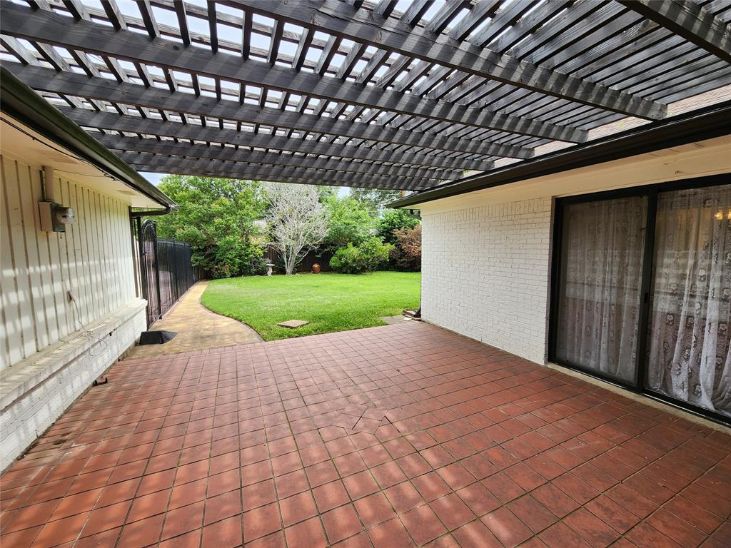 a view of a porch with a backyard