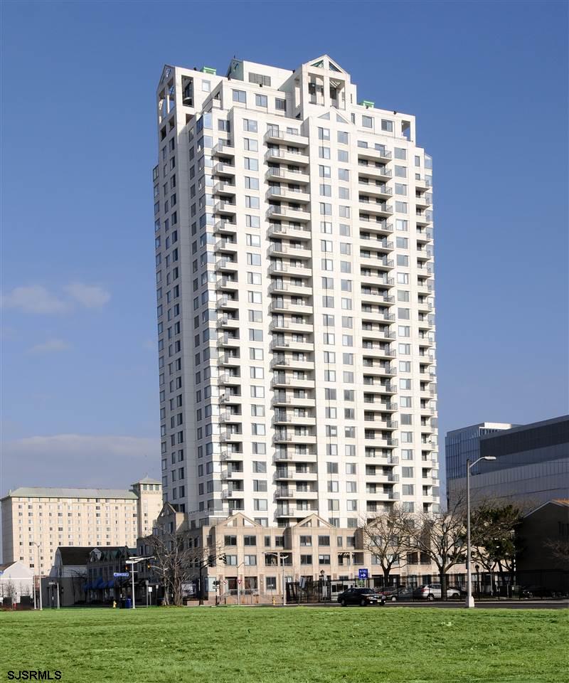 a view of a building with a yard