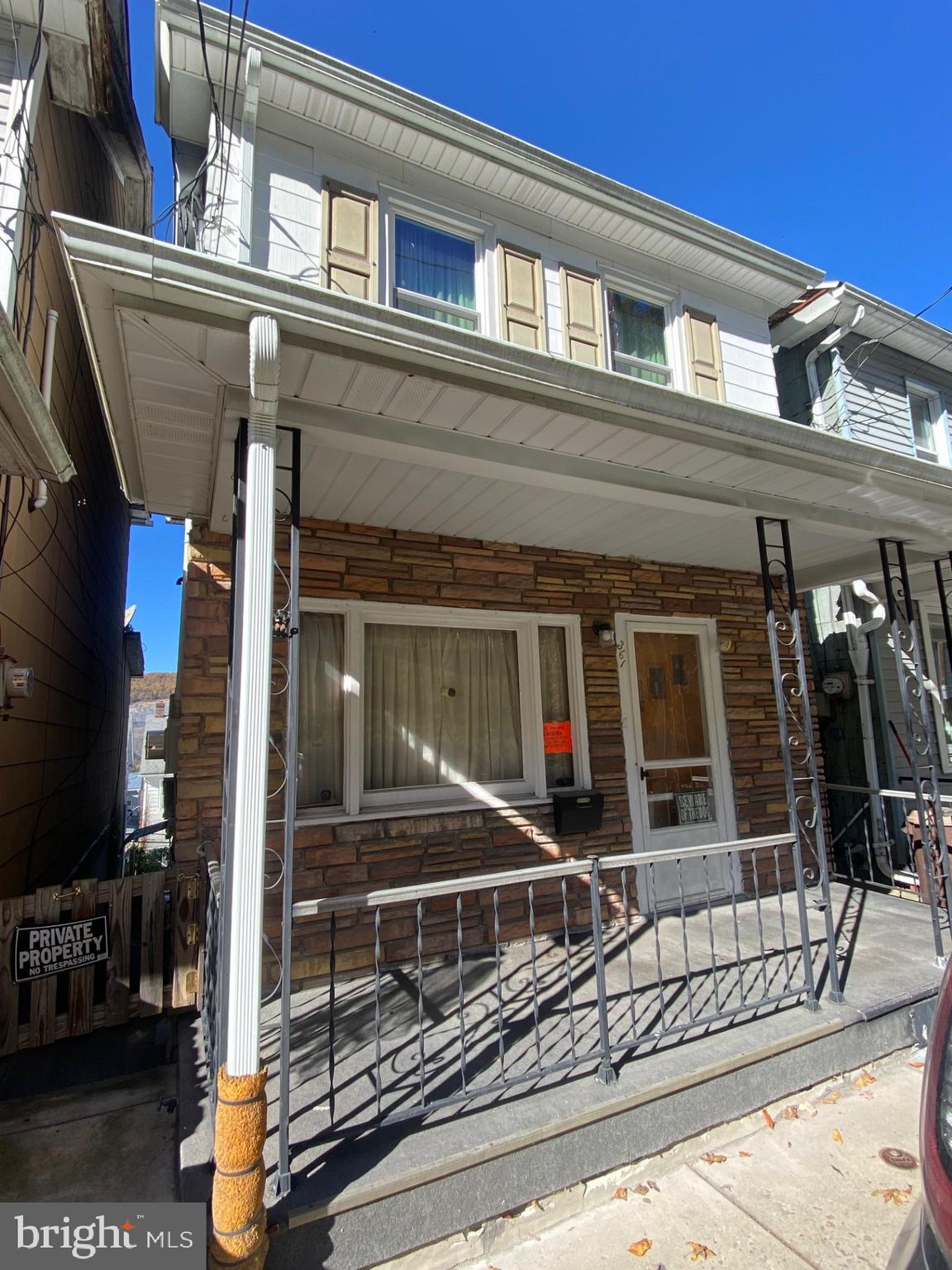 a view of a house with street