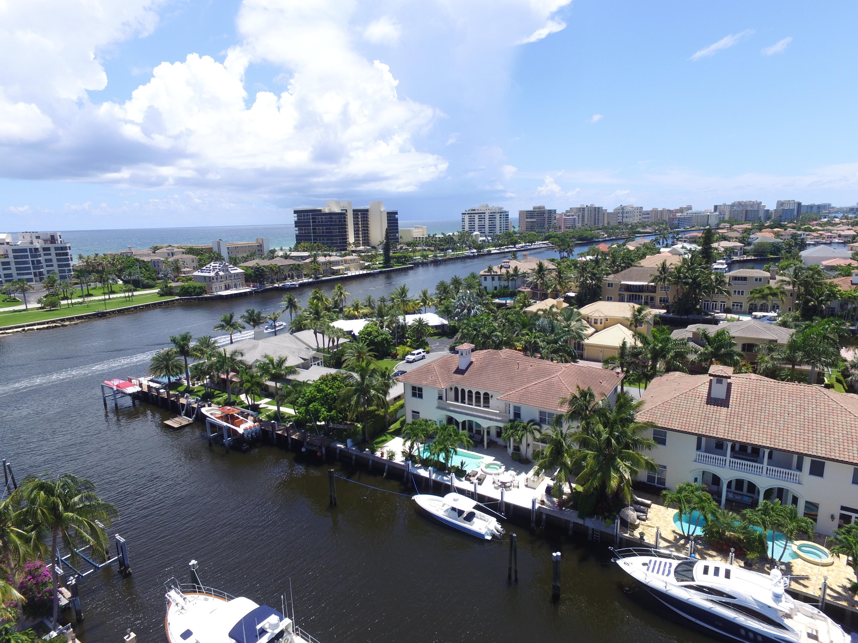 an aerial view of a house with a lake view