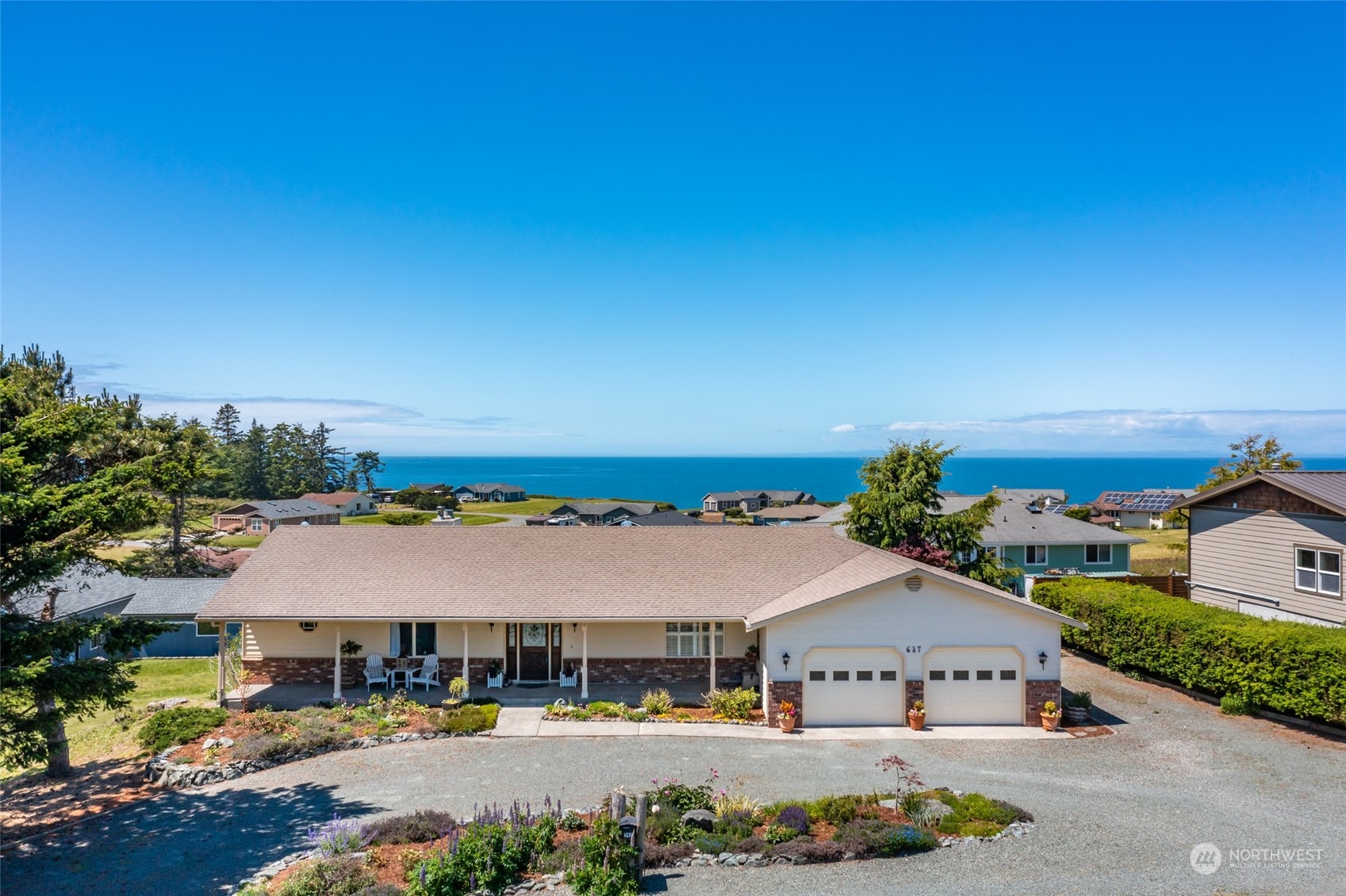 a aerial view of a house with a big yard