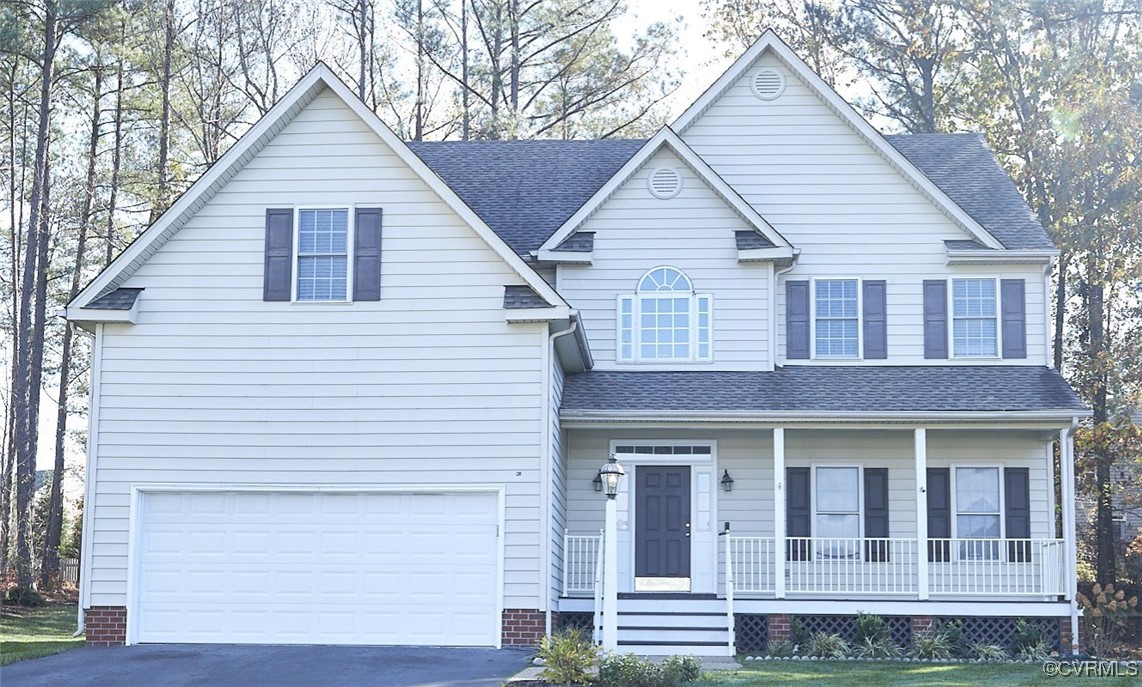 View of front facade with a garage