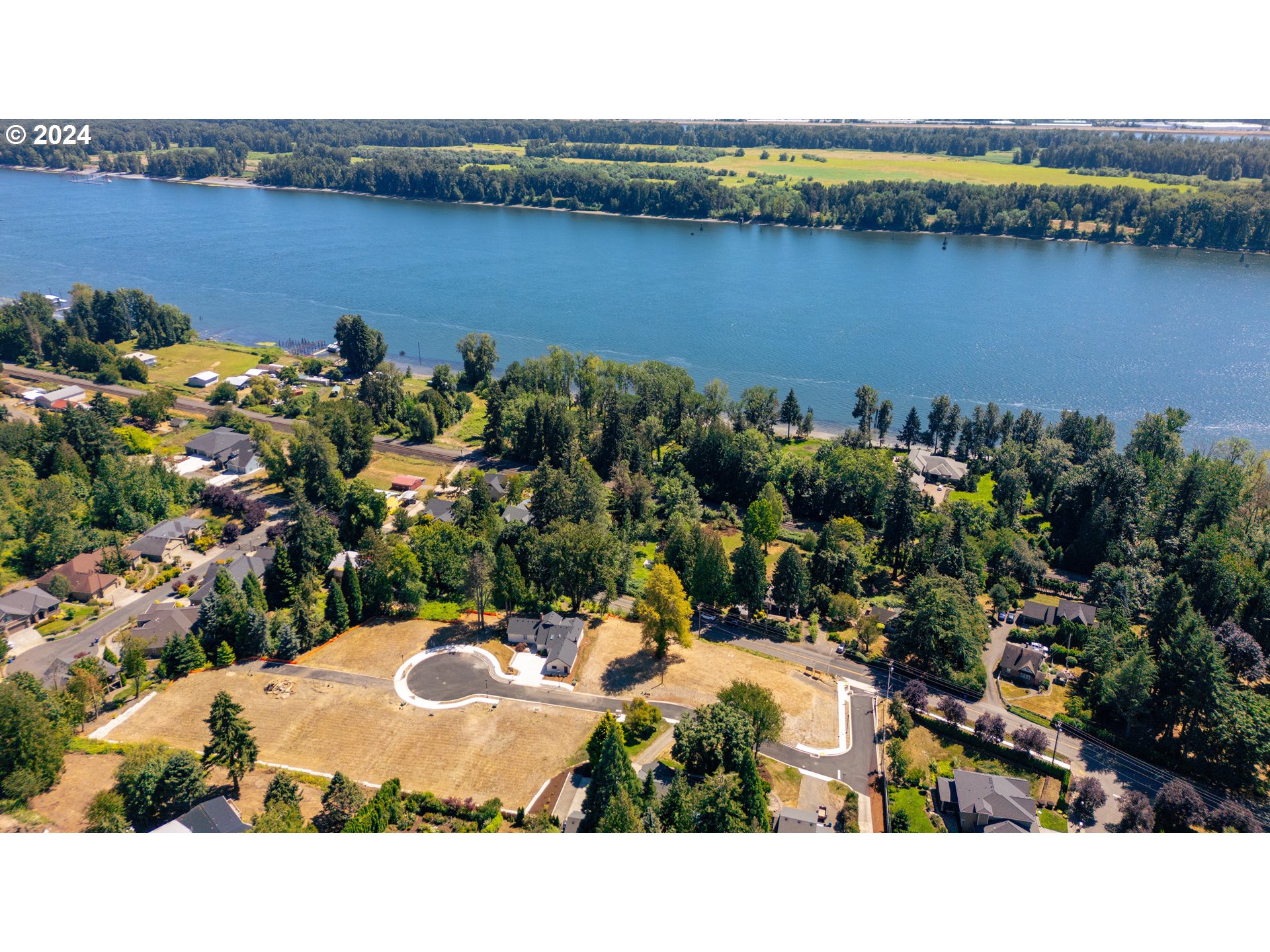 a view of a lake with a building in the background