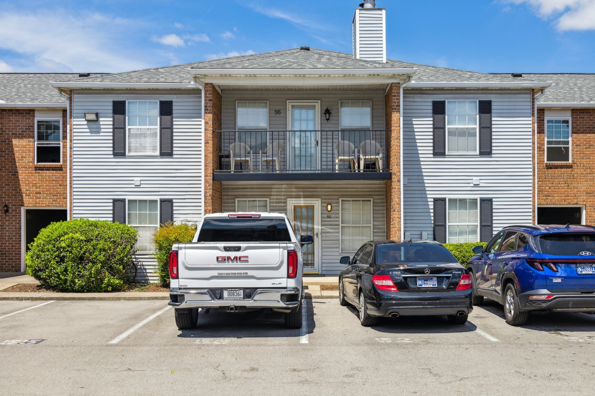 a car parked in front of a house