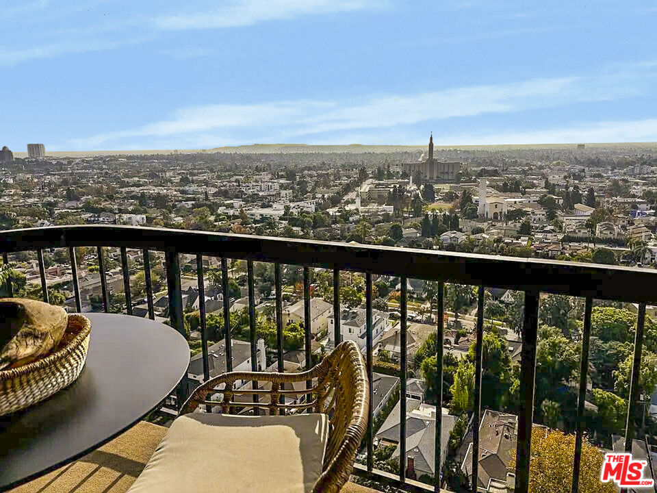 a view of a city from a roof deck