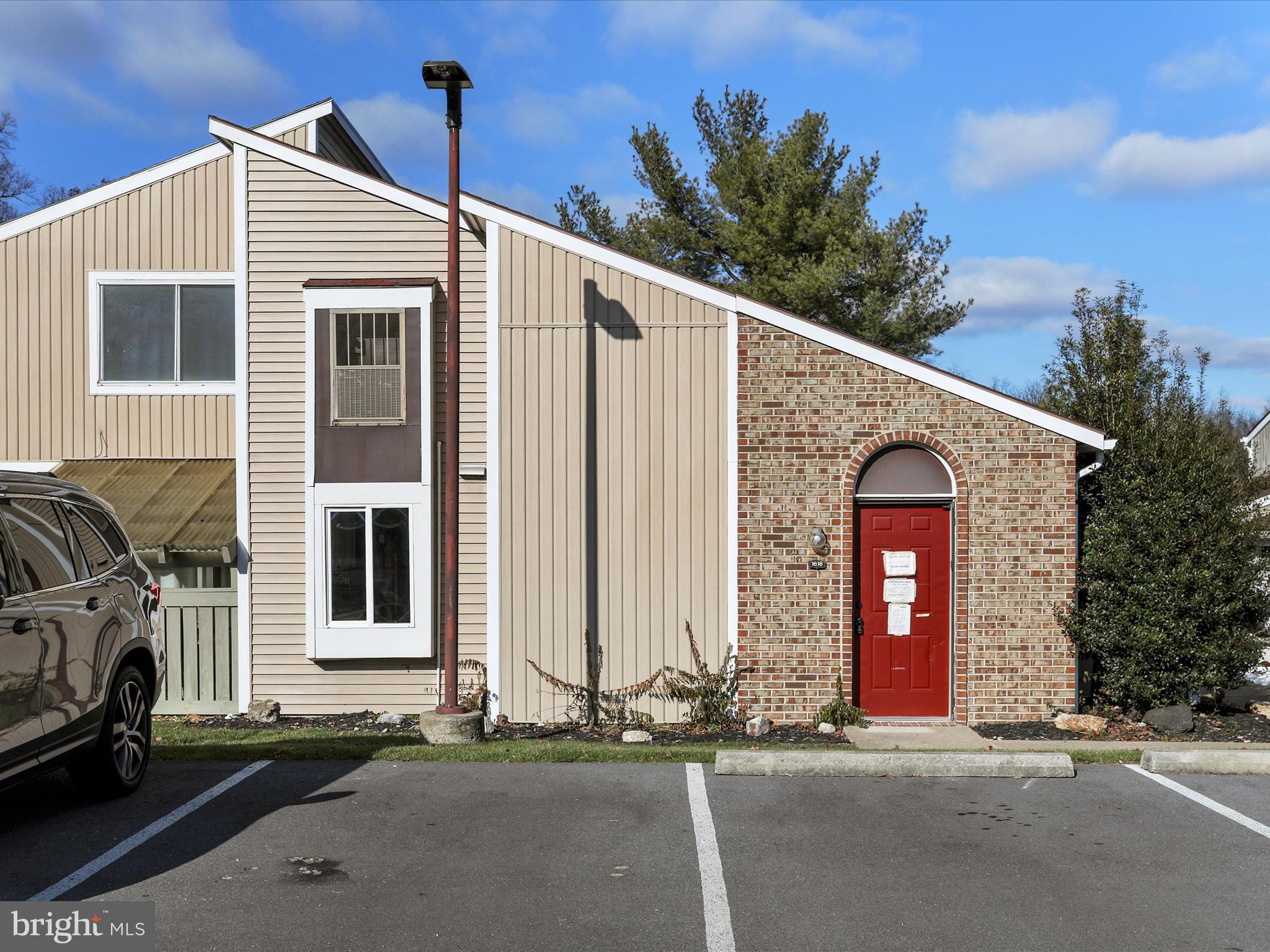 a front view of a house with garage