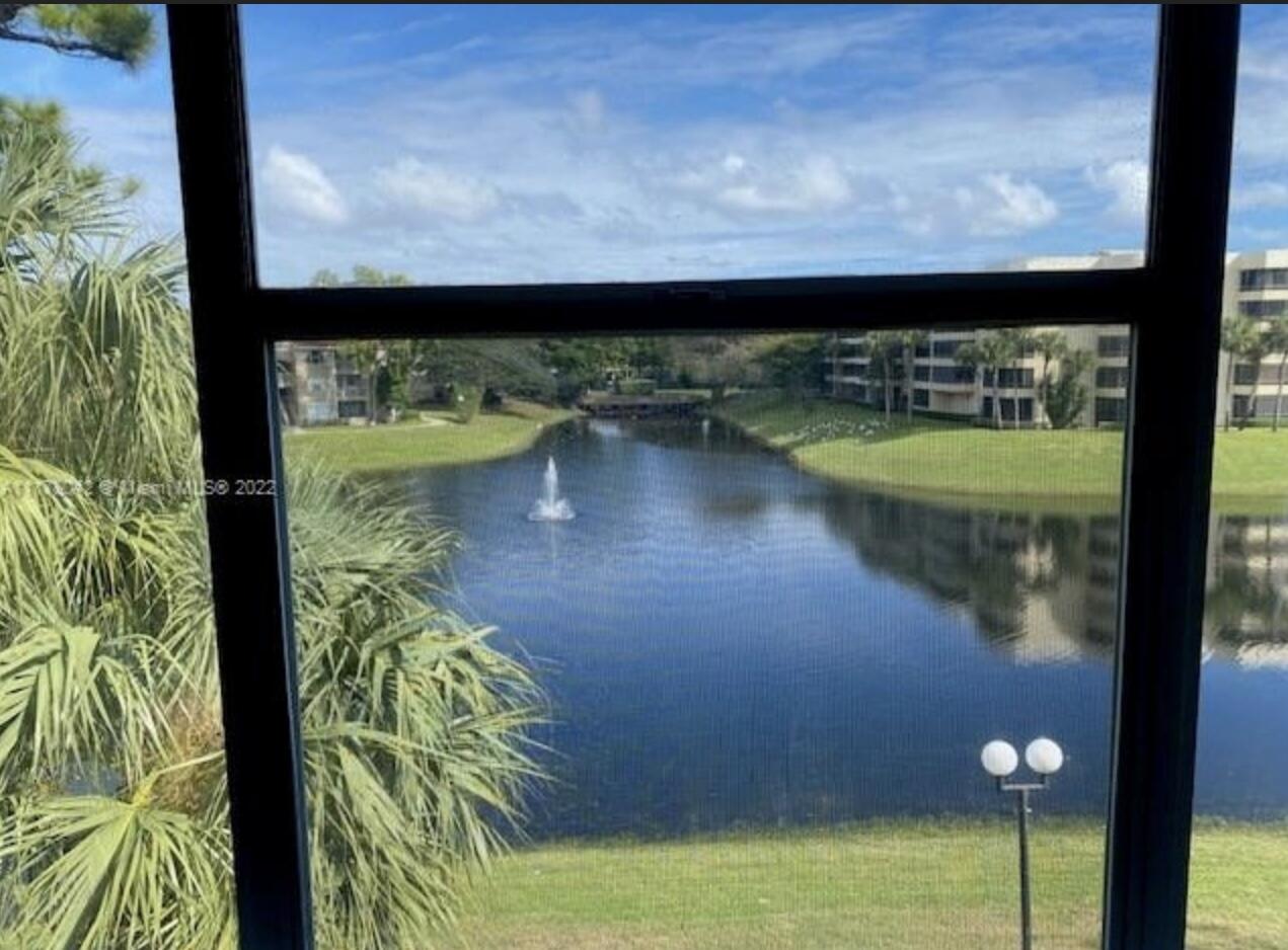 a view of swimming pool from a window