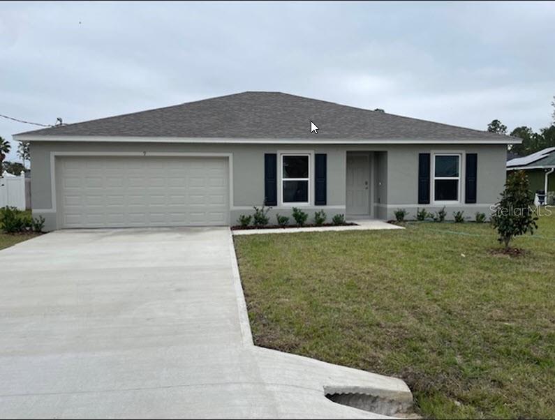 a front view of house with yard