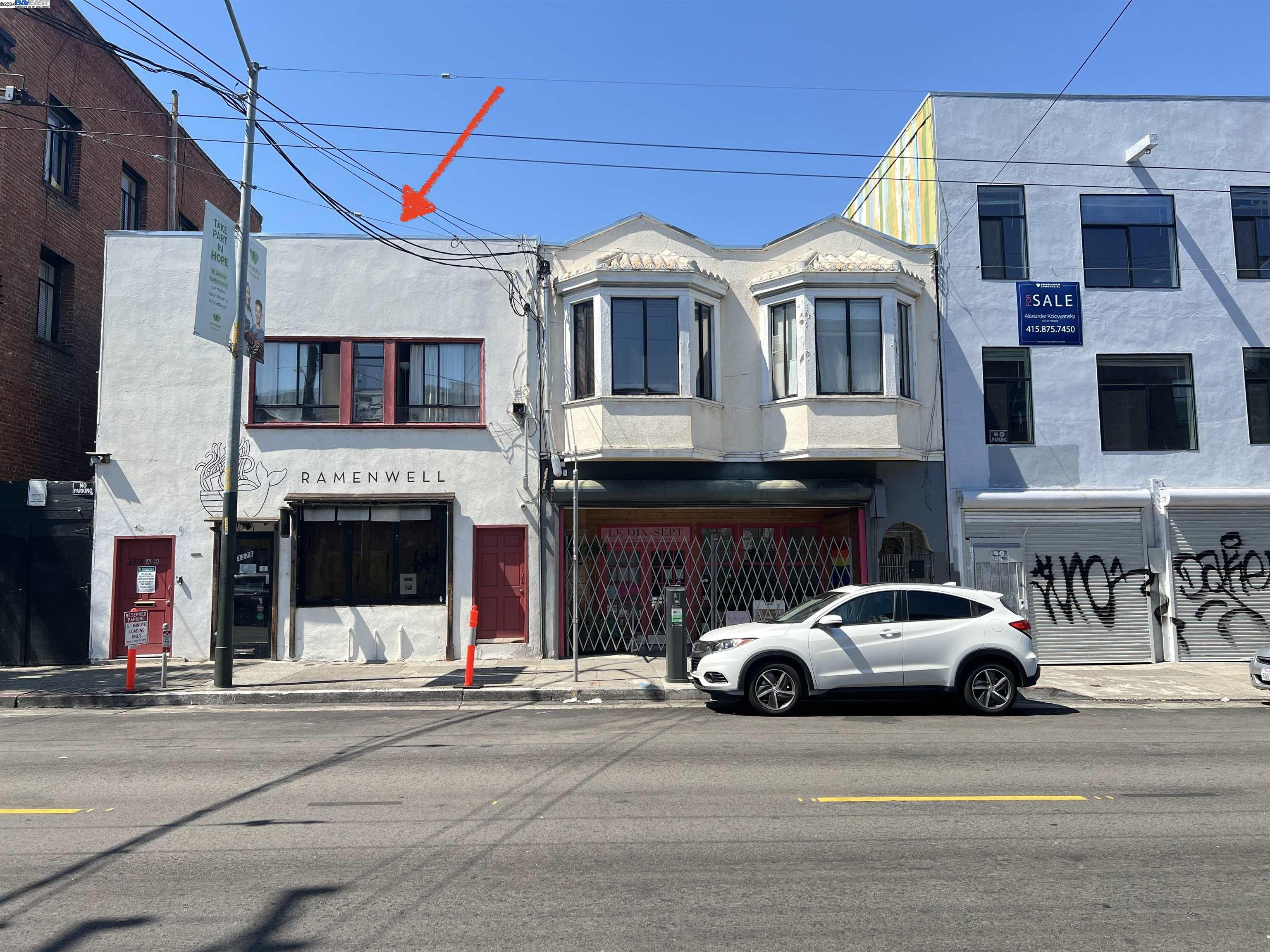 a car parked in front of a building