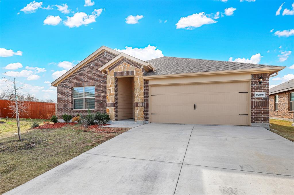 a view of a house with a garage