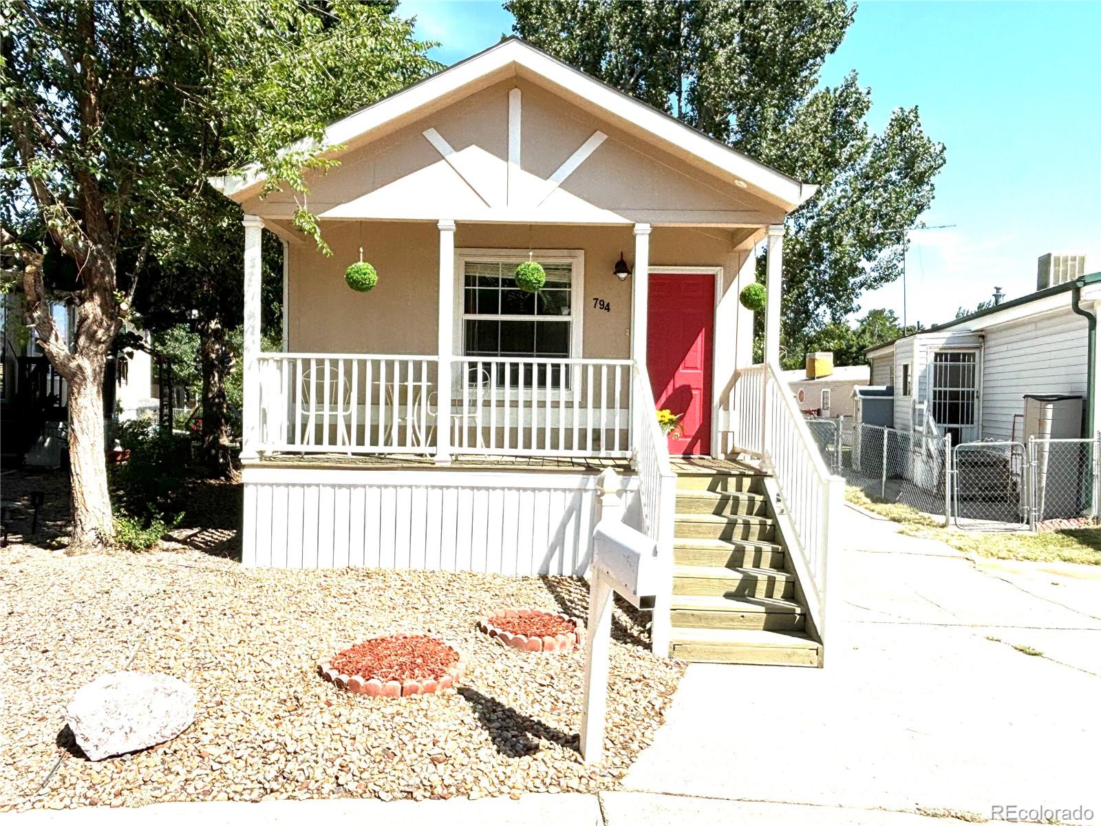 a front view of a house with a patio